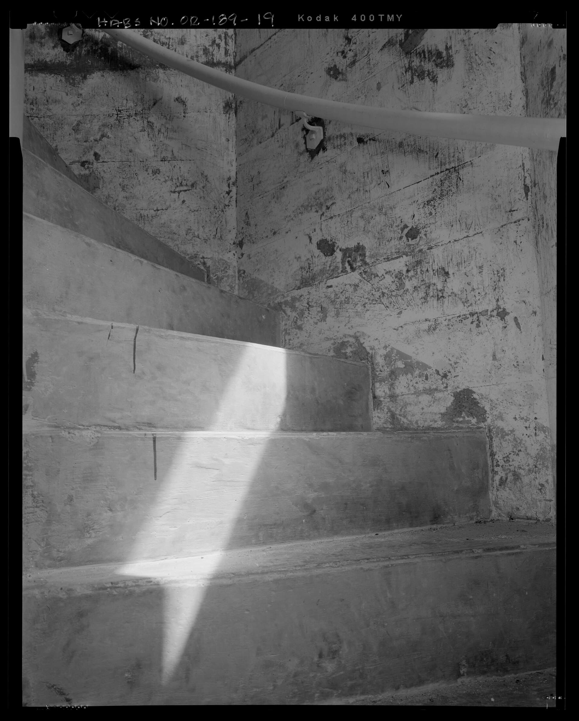 Board-formed concrete wall at a tower stair